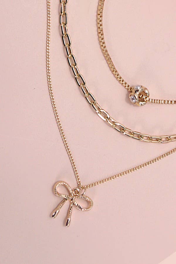 Gold Multi Layer Pearl Bow Charm Necklace