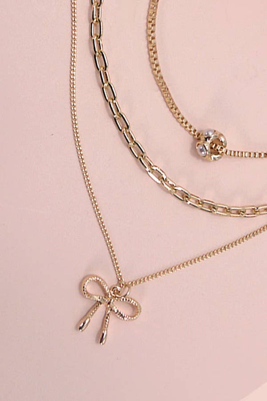 Gold Multi Layer Pearl Bow Charm Necklace