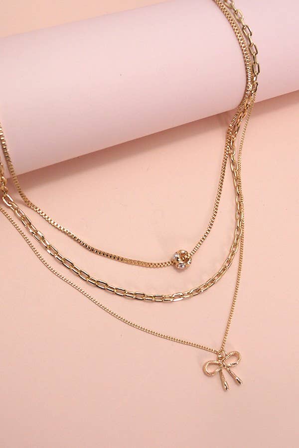 Gold Multi Layer Pearl Bow Charm Necklace
